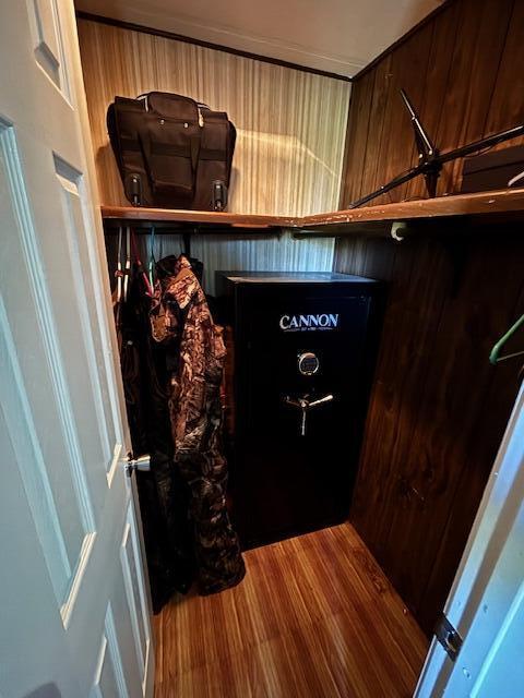 1120 W Montgomery Rd, Camden, MI 49232 - walk in closet featuring wood finished floors