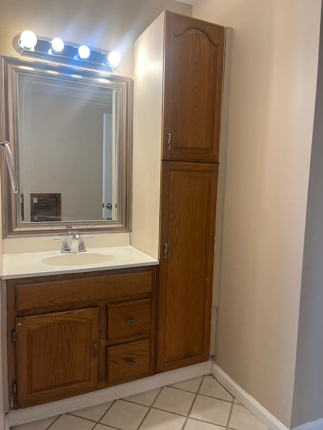 31124 Windsor St, Westland, MI 48185 - bathroom featuring tile patterned flooring, vanity, and baseboards