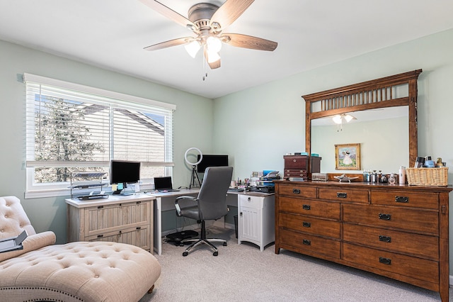 office featuring light carpet, healthy amount of natural light, and ceiling fan