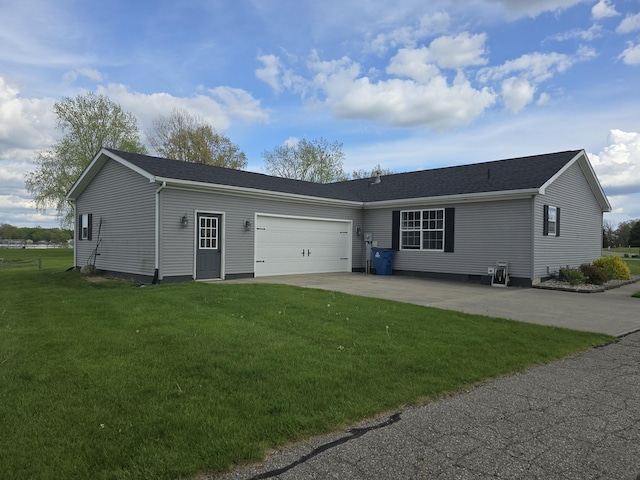 567 Angler Ave, Coldwater, MI 49036 - single story home with concrete driveway, a front lawn, and an attached garage