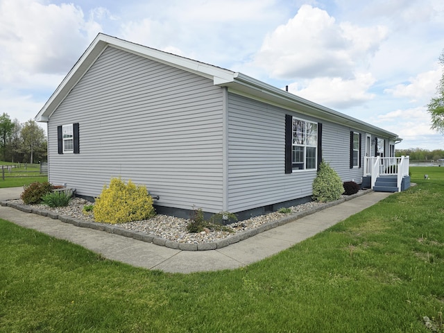 567 Angler Ave, Coldwater, MI 49036 - view of side of property with a lawn