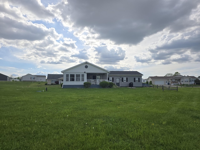 567 Angler Ave, Coldwater, MI 49036 - back of house featuring a sunroom