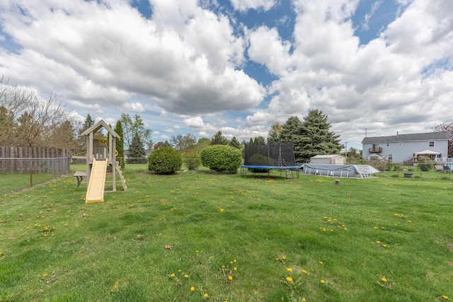 view of yard featuring a trampoline