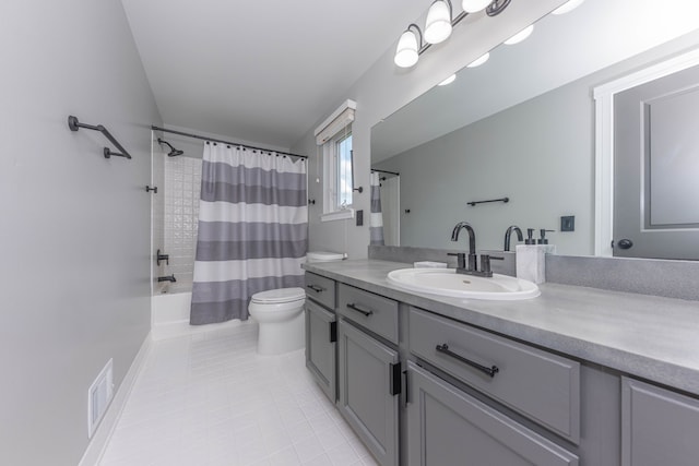 bathroom with tile patterned flooring, toilet, vanity, and shower / bathtub combination with curtain