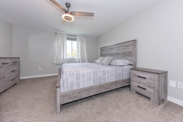 bedroom featuring carpet floors, baseboards, and ceiling fan