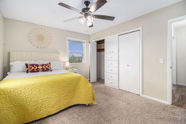 carpeted bedroom with baseboards and a ceiling fan