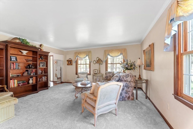 carpeted living room with healthy amount of natural light, ornamental molding, and baseboards