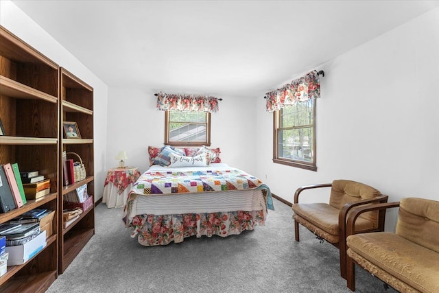 bedroom featuring carpet