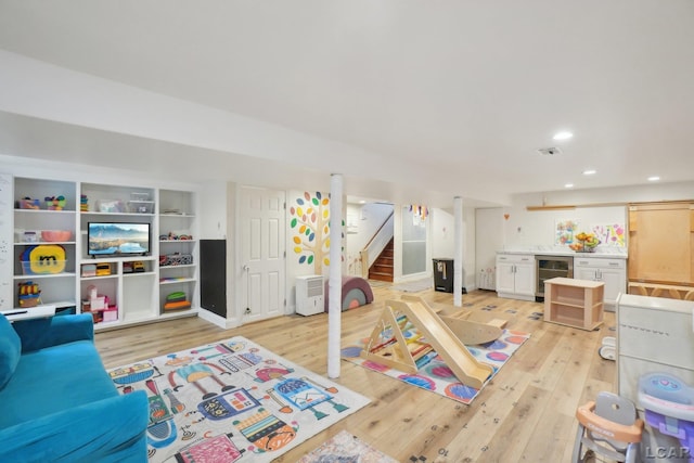2905 Marshall St, Ann Arbor, MI 48108 - game room with beverage cooler, light wood-type flooring, and recessed lighting