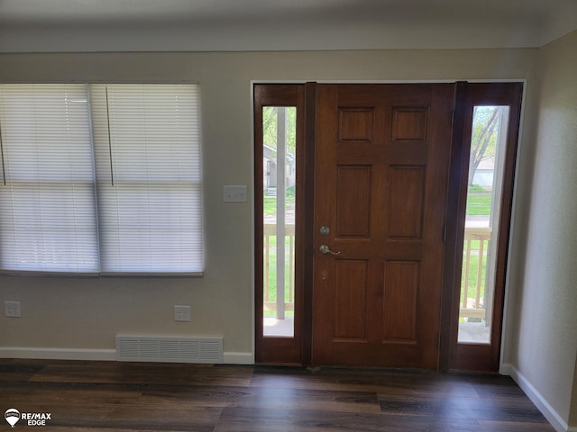 442 Beach St, Mount Morris, MI 48458 - foyer with baseboards and dark wood finished floors