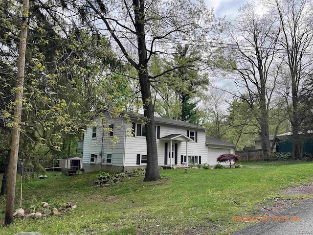7744 Clairmont Rd, Onsted, MI 49265 - view of front of property featuring a garage