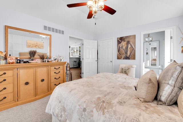 1704 Cassady Place Dr, Plymouth, MI 48170 - bedroom with light carpet, ensuite bath, and ceiling fan