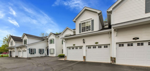 1704 Cassady Place Dr, Plymouth, MI 48170 - view of front facade featuring an attached garage
