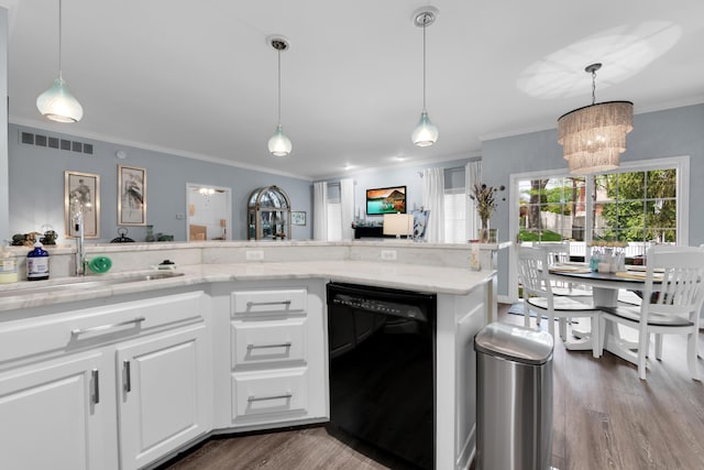1704 Cassady Place Dr, Plymouth, MI 48170 - kitchen with black dishwasher, wood finished floors, a sink, ornamental molding, and light stone countertops