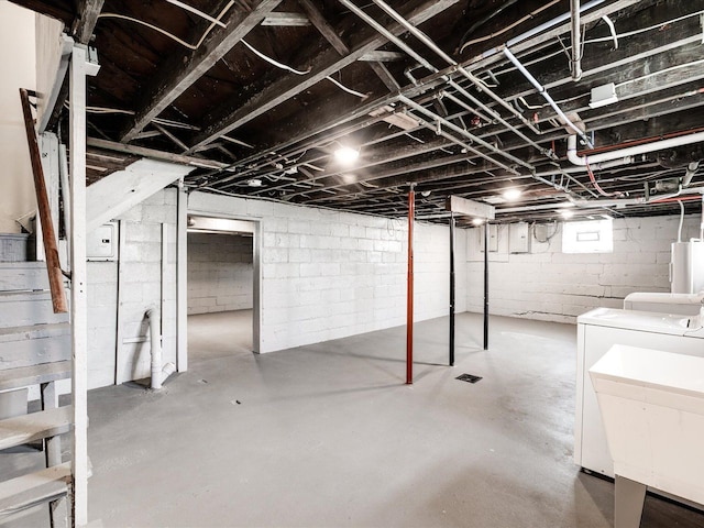below grade area with independent washer and dryer and stairway