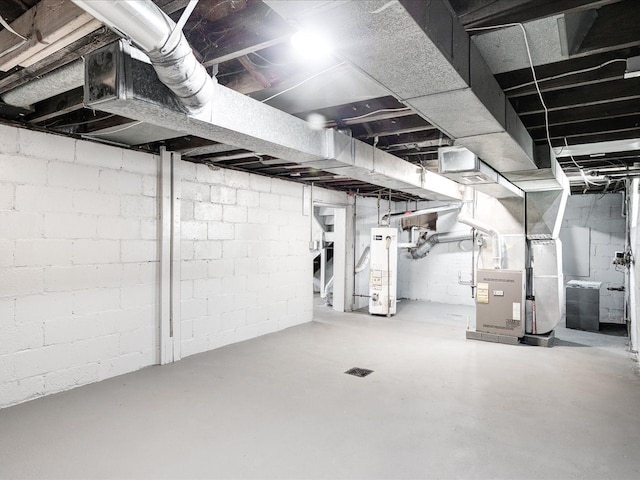 unfinished basement with gas water heater and heating unit