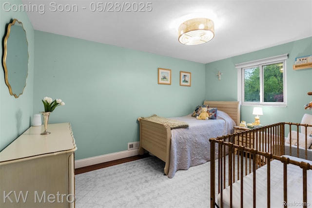 207 Old Perch Rd, Rochester Hills, MI 48309 - bedroom with wood finished floors and baseboards