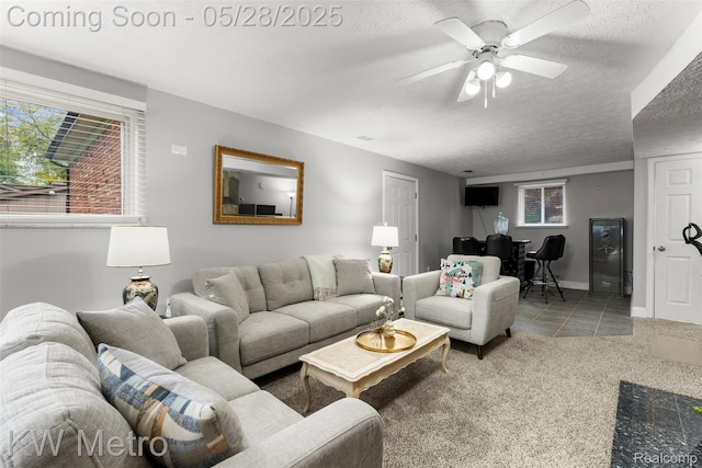 207 Old Perch Rd, Rochester Hills, MI 48309 - carpeted living area featuring ceiling fan, tile patterned floors, a textured ceiling, and baseboards