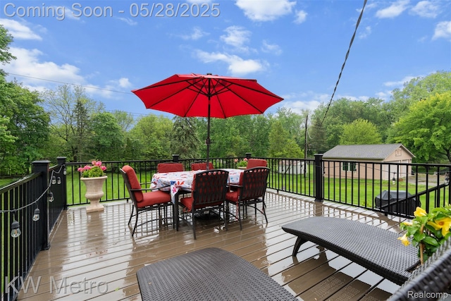 207 Old Perch Rd, Rochester Hills, MI 48309 - deck with outdoor dining space and a lawn