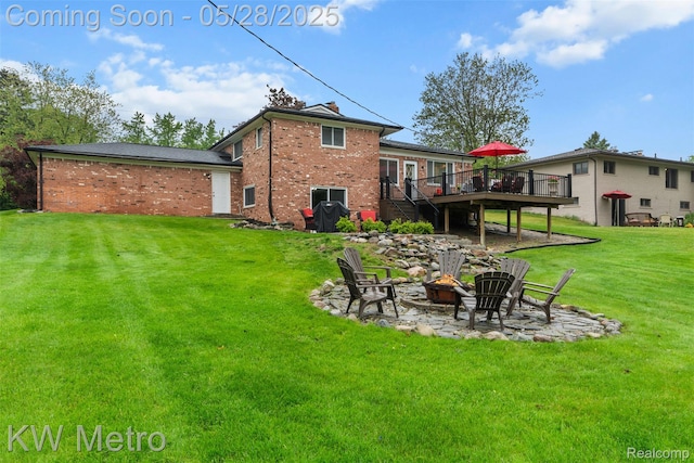 207 Old Perch Rd, Rochester Hills, MI 48309 - back of property featuring a wooden deck, a fire pit, a yard, brick siding, and stairway