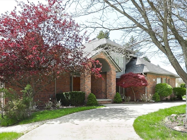 3744 Riverview Ter N, East China, MI 48054 - view of front of property with brick siding and curved driveway