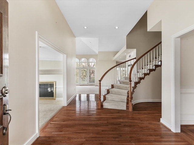 3744 Riverview Ter N, East China, MI 48054 - entryway with stairs, wood finished floors, and baseboards