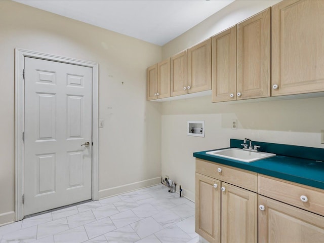 3744 Riverview Ter N, East China, MI 48054 - laundry area featuring hookup for a washing machine, cabinet space, light marble finish floors, and baseboards