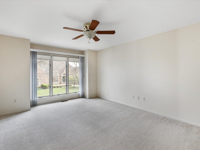 3744 Riverview Ter N, East China, MI 48054 - unfurnished room featuring carpet floors, a ceiling fan, and baseboards