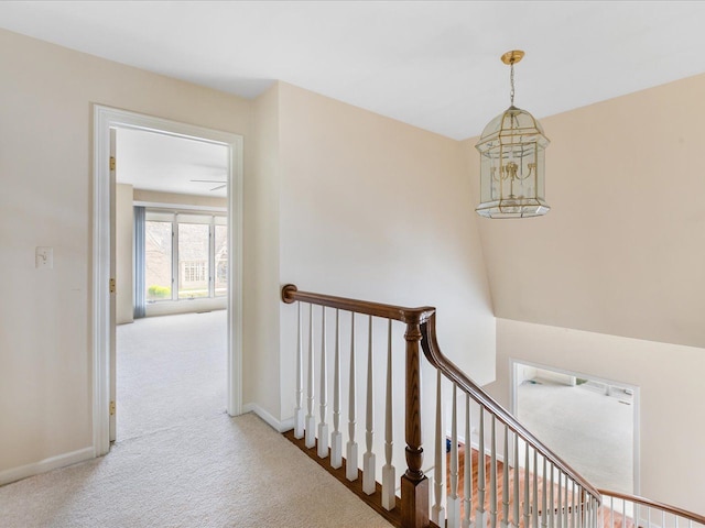 3744 Riverview Ter N, East China, MI 48054 - hallway with carpet flooring, an upstairs landing, and baseboards