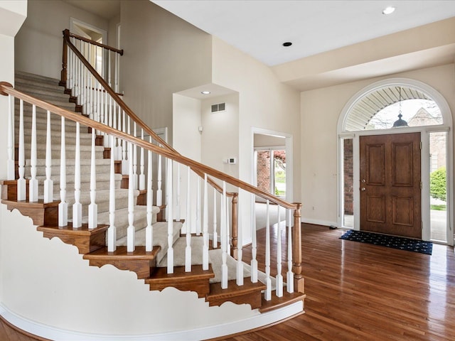 3744 Riverview Ter N, East China, MI 48054 - foyer with wood finished floors, stairway, baseboards, and recessed lighting