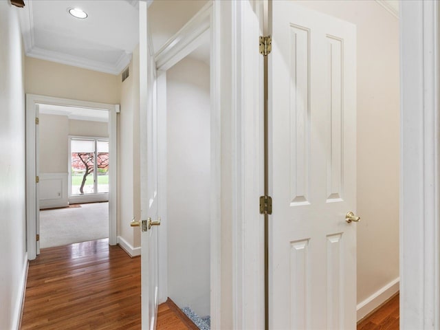 3744 Riverview Ter N, East China, MI 48054 - corridor with ornamental molding, wood finished floors, baseboards, and recessed lighting