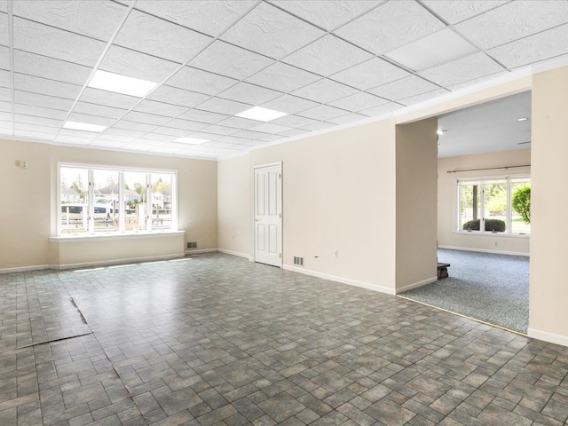 3744 Riverview Ter N, East China, MI 48054 - empty room featuring a drop ceiling and baseboards