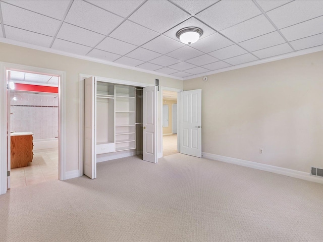 3744 Riverview Ter N, East China, MI 48054 - unfurnished bedroom featuring light colored carpet, baseboards, a closet, ornamental molding, and ensuite bath
