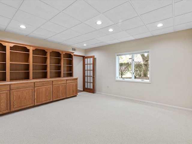 3744 Riverview Ter N, East China, MI 48054 - empty room featuring light colored carpet, baseboards, recessed lighting, and a drop ceiling