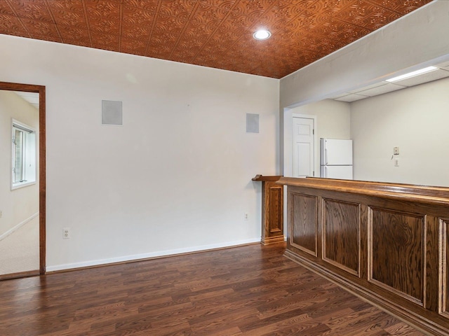 3744 Riverview Ter N, East China, MI 48054 - bar area with freestanding refrigerator, dark wood-type flooring, an ornate ceiling, baseboards, and recessed lighting