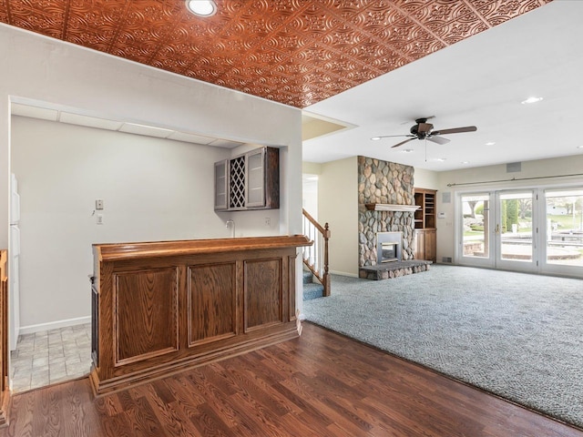 3744 Riverview Ter N, East China, MI 48054 - unfurnished living room with a ceiling fan, baseboards, recessed lighting, stairs, and wood finished floors