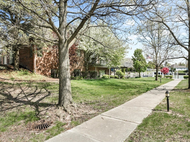 3744 Riverview Ter N, East China, MI 48054 - surrounding community featuring a lawn