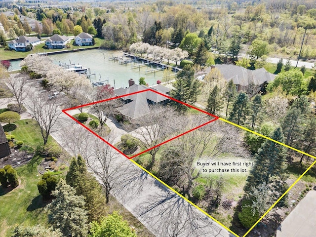 3744 Riverview Ter N, East China, MI 48054 - aerial perspective of suburban area featuring property parcel outlined and a large body of water