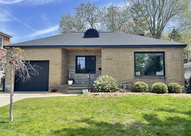 view of front facade featuring brick siding, a garage, a front lawn, and a shingled roof