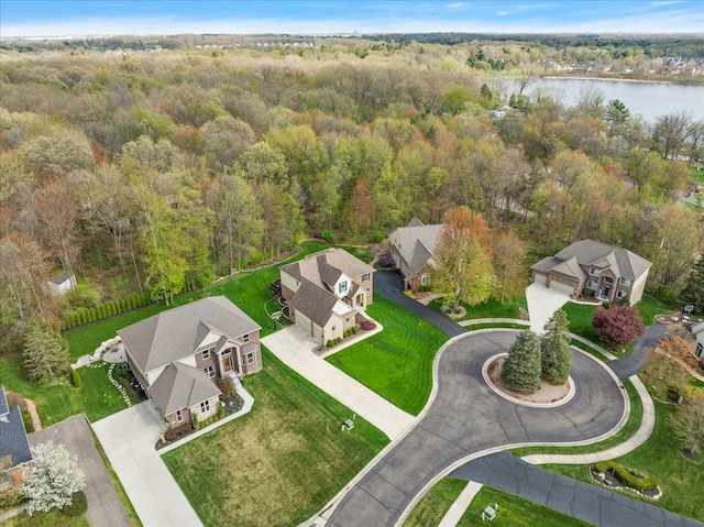 5633 Golf Pointe Dr, Clarkston, MI 48348 - view of property location with a nearby body of water, a forest, and nearby suburban area