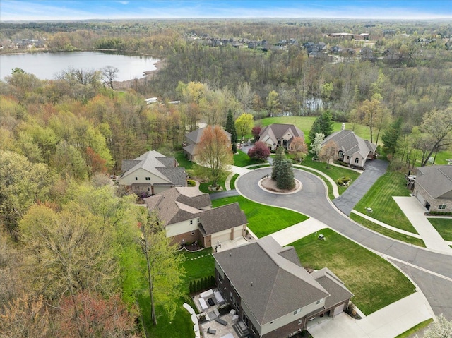 5633 Golf Pointe Dr, Clarkston, MI 48348 - aerial perspective of suburban area with a large body of water and a forest