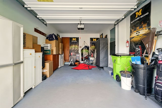 garage featuring a garage door opener