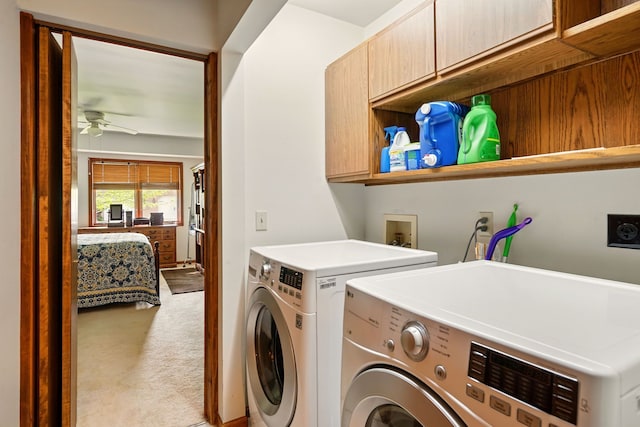 washroom with cabinet space, washing machine and dryer, carpet floors, and ceiling fan