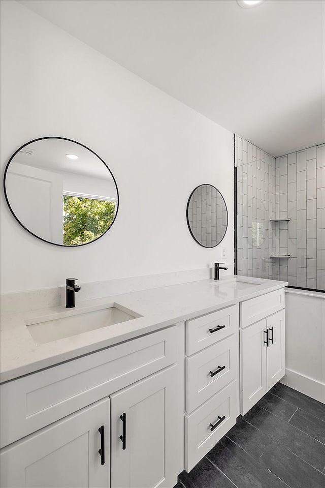 1148 E George Ave, Hazel Park, MI 48030 - full bathroom featuring double vanity and a tile shower