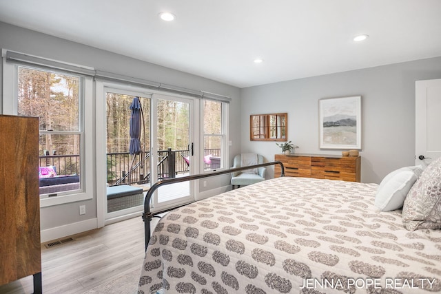 16840 Cricket Ct, Grand Haven, MI 49417 - bedroom featuring access to exterior, light wood-style flooring, baseboards, and recessed lighting