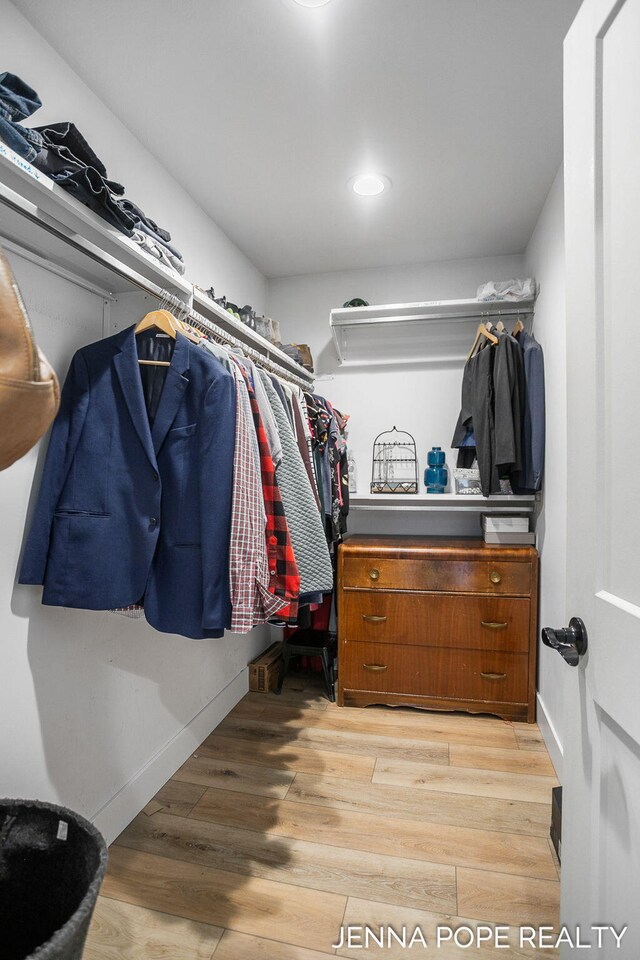 16840 Cricket Ct, Grand Haven, MI 49417 - spacious closet featuring light wood-type flooring