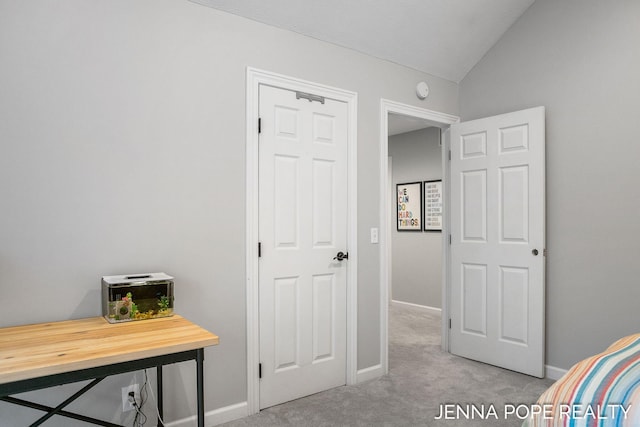 16840 Cricket Ct, Grand Haven, MI 49417 - bedroom featuring carpet floors, lofted ceiling, and baseboards