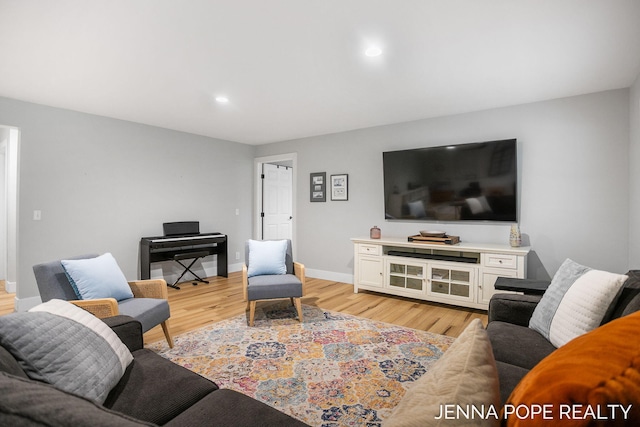16840 Cricket Ct, Grand Haven, MI 49417 - living room featuring light wood finished floors, baseboards, and recessed lighting