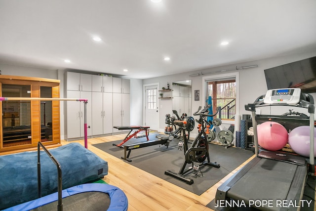 16840 Cricket Ct, Grand Haven, MI 49417 - exercise room featuring wood finished floors and recessed lighting