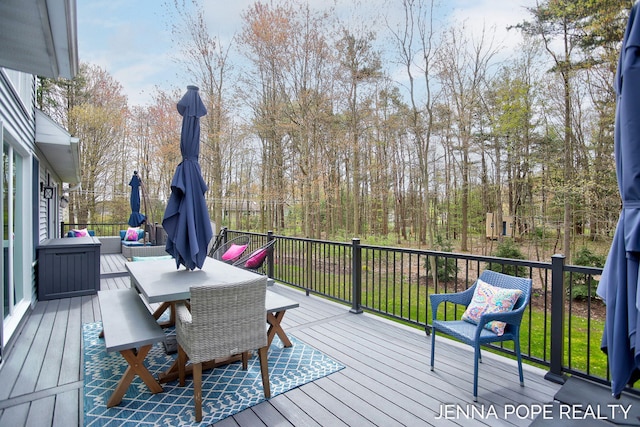 16840 Cricket Ct, Grand Haven, MI 49417 - deck featuring outdoor dining space
